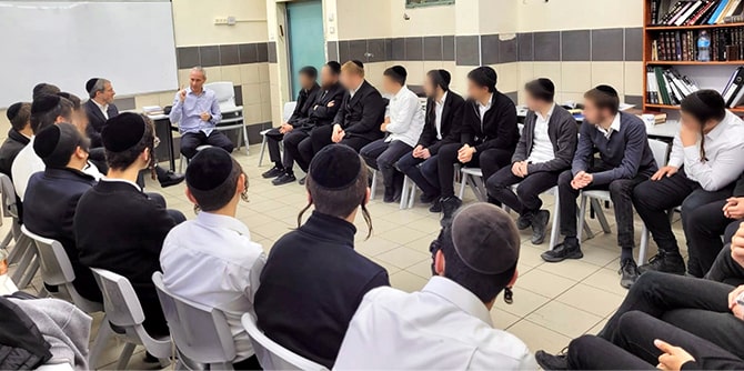 Students in the Netzach yeshiva meet with MK Chili Troper (Photo: Torah Academy)